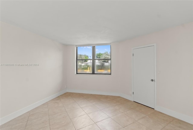 view of tiled spare room