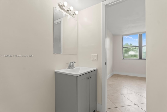 bathroom with vanity and tile patterned flooring