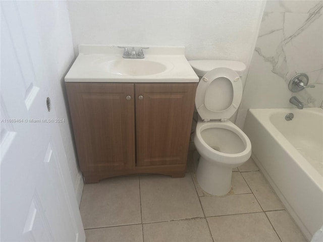 full bathroom featuring vanity, tile patterned flooring, toilet, and shower / bathtub combination