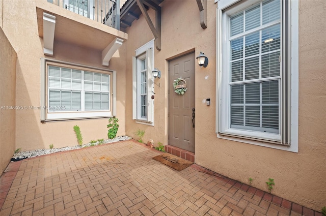 622 SW 147th Ter, Pembroke Pines, FL 33027 - doorway to property featuring stucco siding and a patio