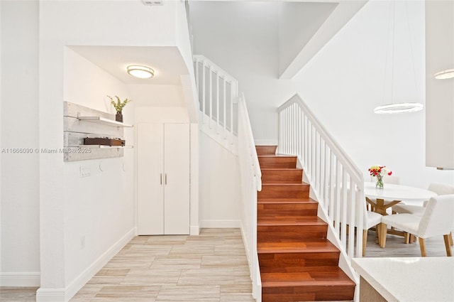 622 SW 147th Ter, Pembroke Pines, FL 33027 - staircase with baseboards and wood finished floors