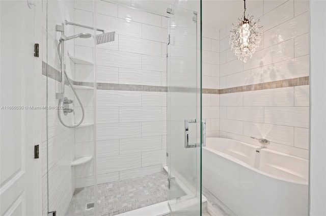 622 SW 147th Ter, Pembroke Pines, FL 33027 - bathroom with a garden tub, a stall shower, and a chandelier
