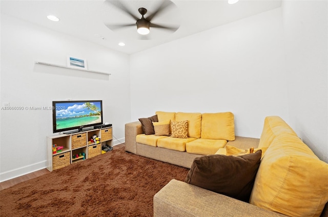 living room featuring ceiling fan