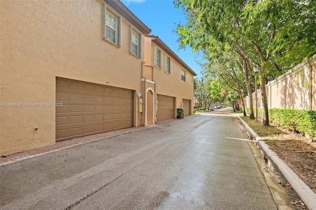 exterior space with a garage