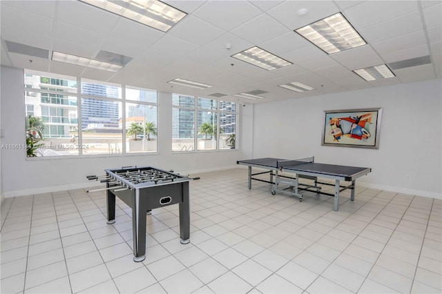 game room featuring light tile patterned floors