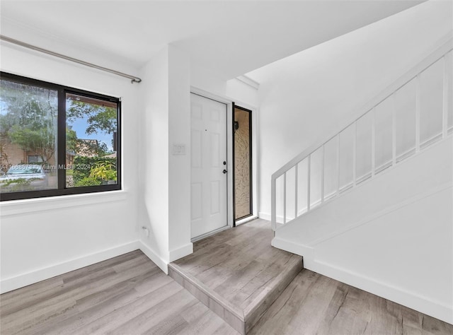 foyer entrance featuring light wood-type flooring