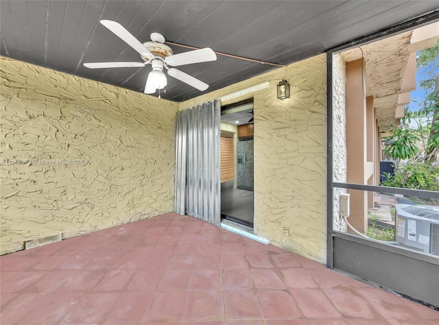 view of patio with ceiling fan and cooling unit