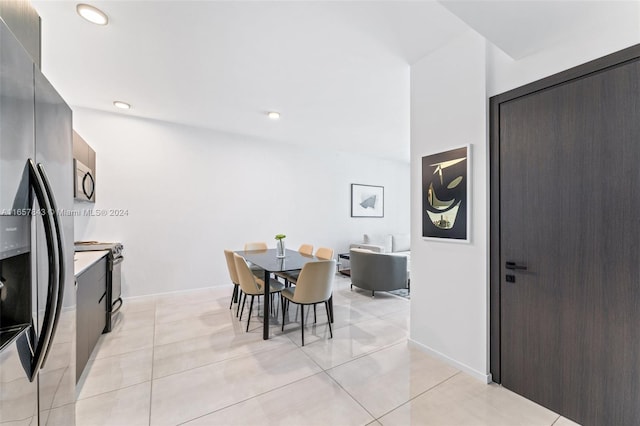 398 NE 5th St Unit 1419, Miami, FL 33132 - dining area with light tile patterned floors and recessed lighting