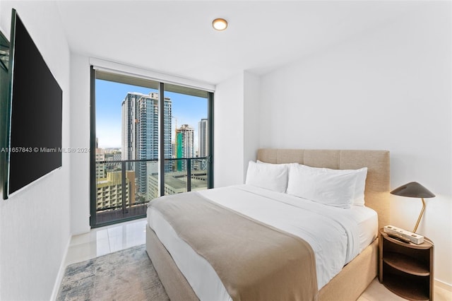 398 NE 5th St Unit 1419, Miami, FL 33132 - bedroom with a view of city, expansive windows, and access to exterior