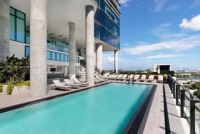 view of swimming pool with a patio