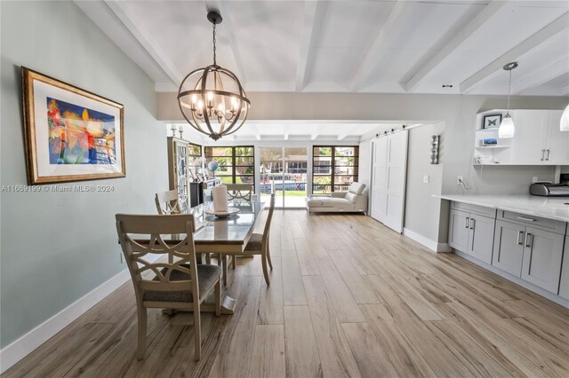 dining room with an inviting chandelier, beamed ceiling, and light wood-type flooring