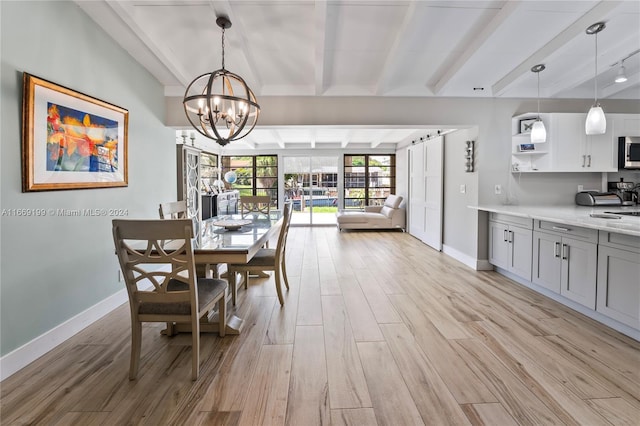 dining area featuring an inviting chandelier, light hardwood / wood-style flooring, and beam ceiling