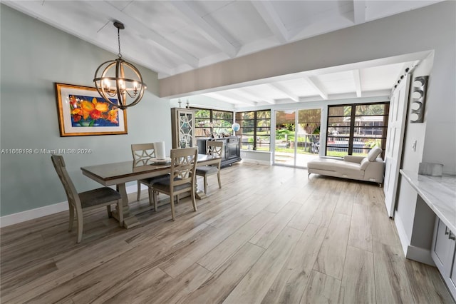 dining area featuring light hardwood / wood-style flooring, lofted ceiling with beams, and a chandelier