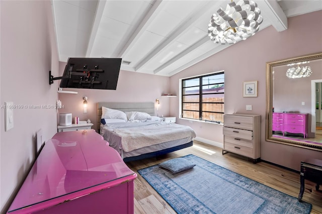 bedroom featuring vaulted ceiling with beams, an inviting chandelier, and light hardwood / wood-style floors