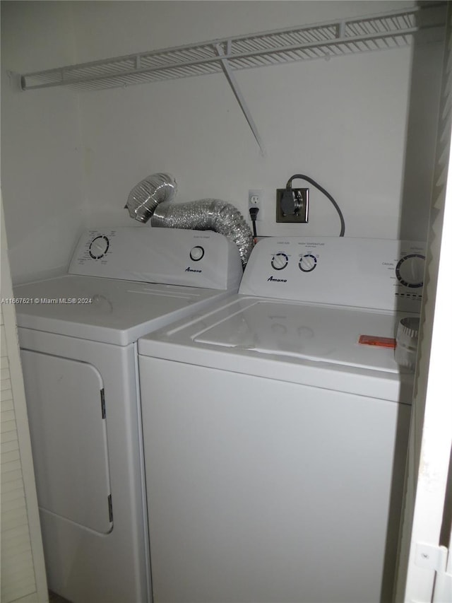 laundry area with laundry area and washer and dryer