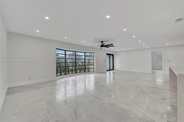 spare room featuring ceiling fan