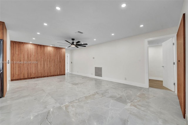 spare room with ceiling fan