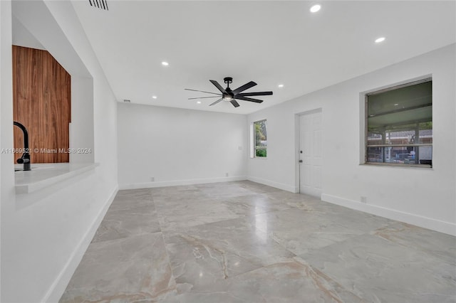 spare room featuring ceiling fan