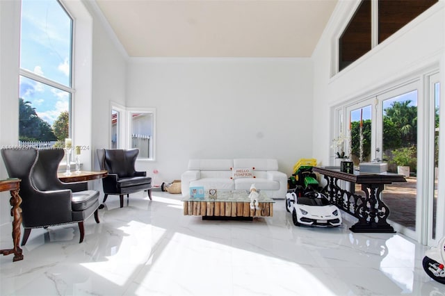 bedroom with french doors and a towering ceiling