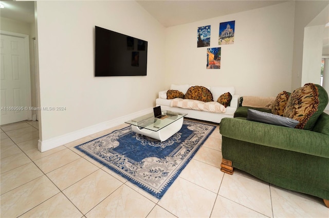 tiled living room with vaulted ceiling