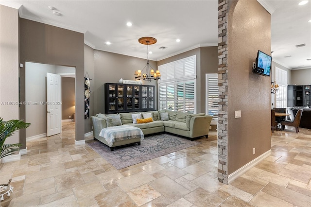 living room with ornamental molding and an inviting chandelier