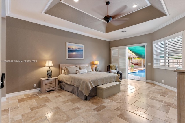 bedroom with crown molding, a tray ceiling, ceiling fan, and access to exterior