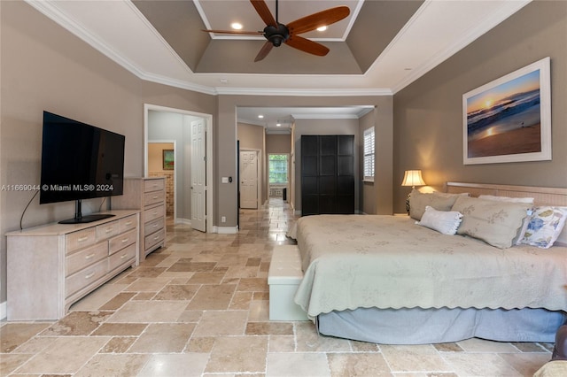 bedroom featuring crown molding, ceiling fan, and a raised ceiling