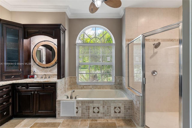 bathroom with independent shower and bath, vanity, ornamental molding, and ceiling fan