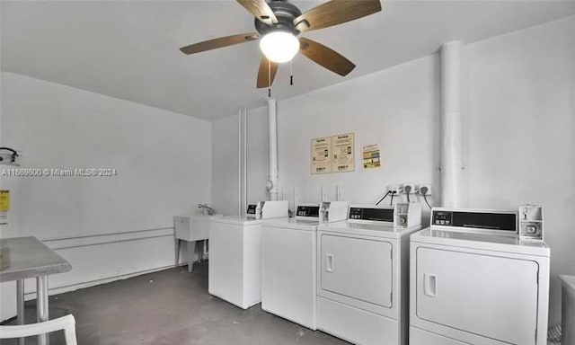 laundry room with ceiling fan, sink, and washer and dryer