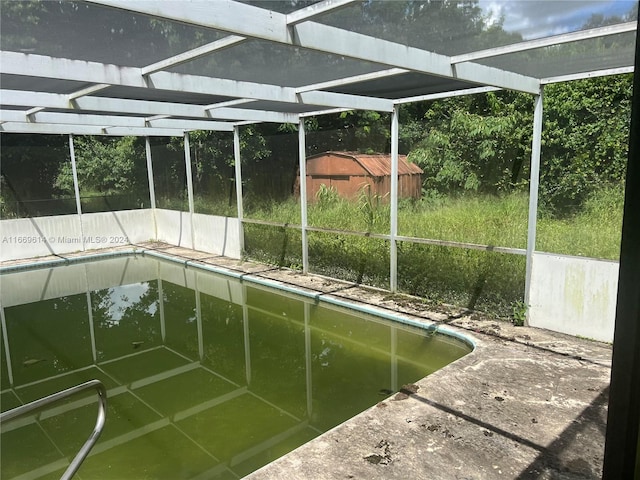 153 NE Prima Vista Blvd, Port St Lucie, FL 34983 - view of swimming pool with a lanai