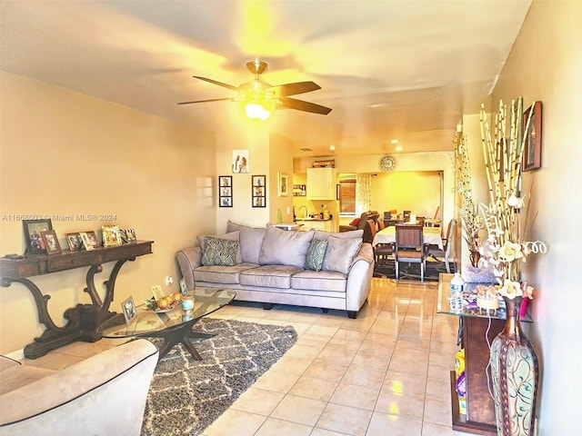 tiled living room featuring ceiling fan