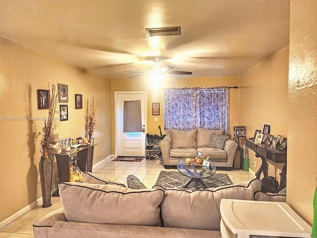 tiled living room featuring ceiling fan