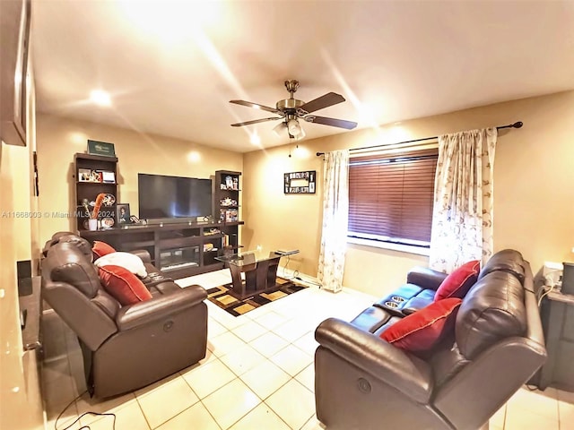 tiled living room with ceiling fan