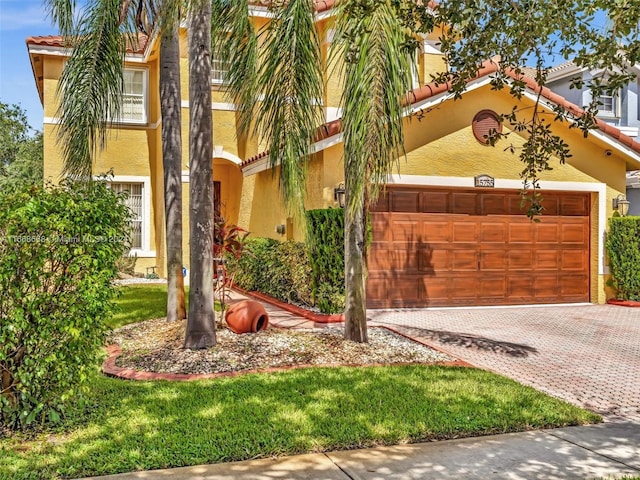 view of front of house with a garage