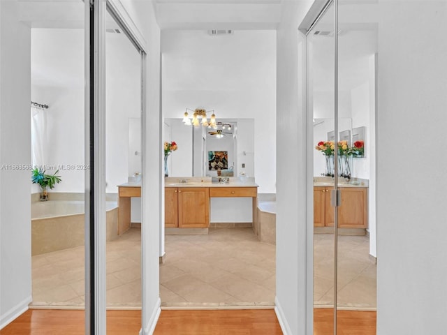 bathroom featuring vanity, tile patterned floors, and independent shower and bath