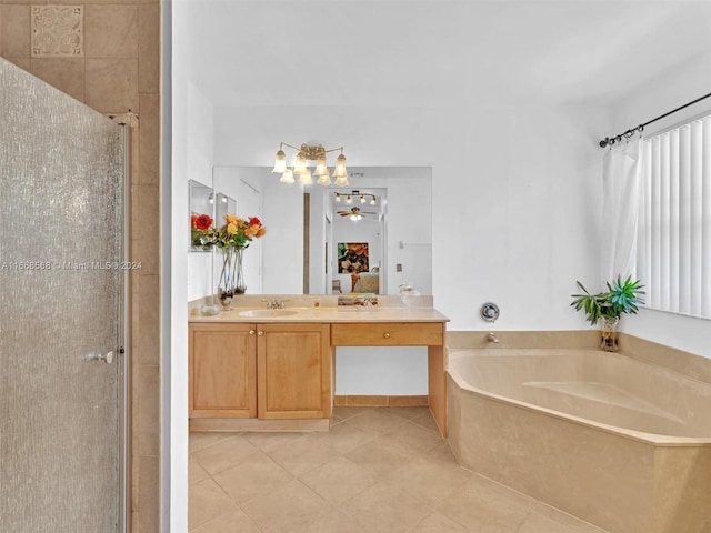 bathroom with vanity, shower with separate bathtub, and tile patterned flooring