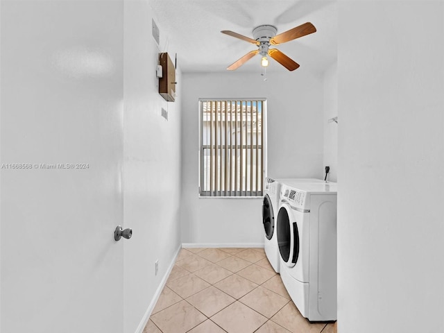 laundry room featuring washer and dryer, light tile patterned floors, and ceiling fan