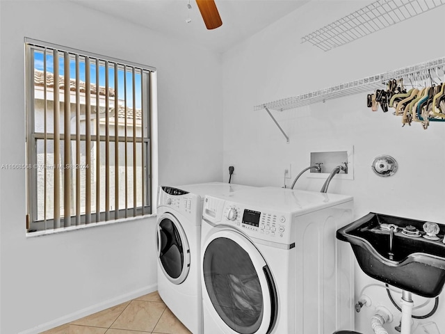 laundry area with ceiling fan, light tile patterned floors, and washing machine and clothes dryer