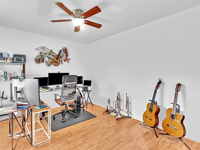 office space featuring hardwood / wood-style floors and ceiling fan