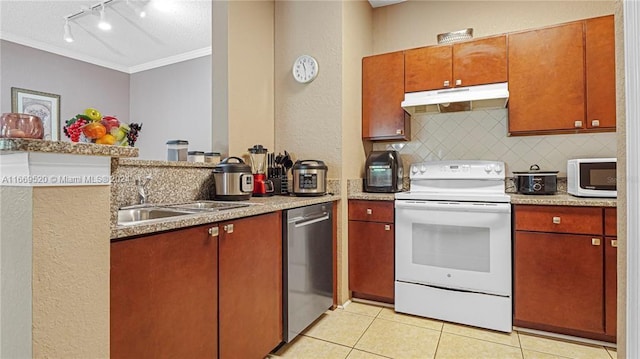 kitchen featuring light tile patterned flooring, ornamental molding, sink, white appliances, and backsplash