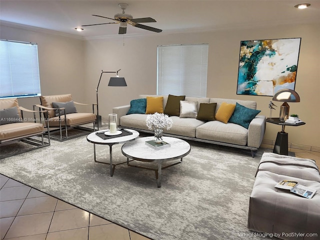 tiled living room featuring crown molding and ceiling fan