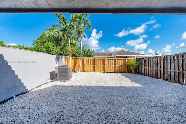 view of yard featuring central AC