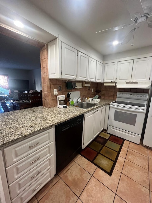 kitchen with black dishwasher, sink, white range with electric cooktop, and white cabinetry