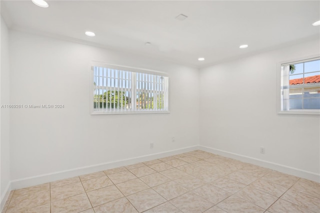 view of tiled spare room