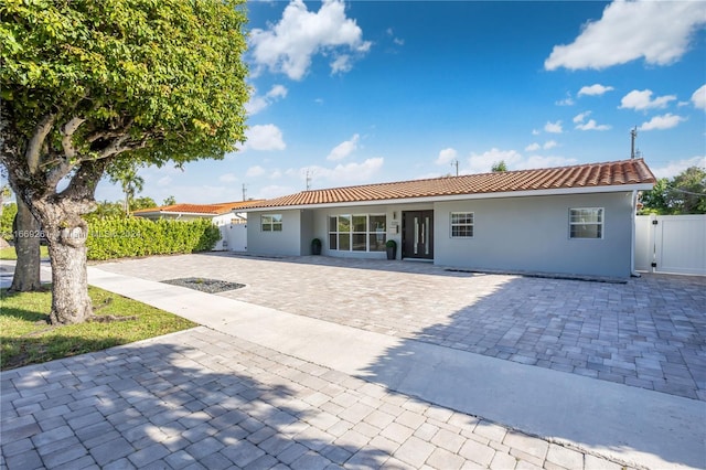 back of house with a patio area