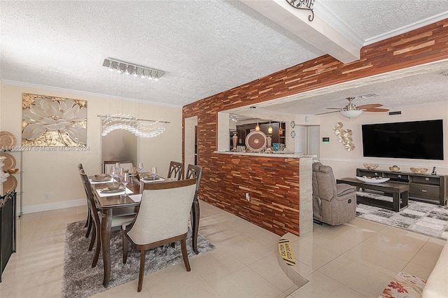 dining area with ceiling fan, a textured ceiling, beam ceiling, and light tile patterned floors