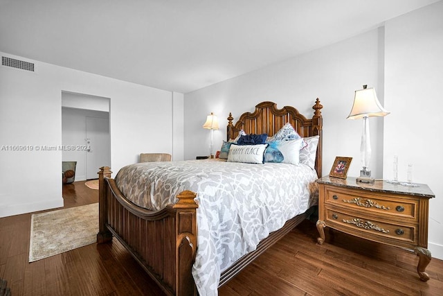 bedroom featuring dark wood-type flooring