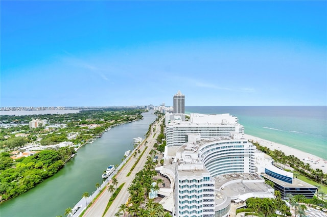 aerial view featuring a water view and a view of the beach