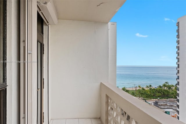 balcony featuring a water view