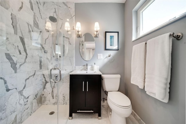 bathroom featuring tile patterned flooring, walk in shower, vanity, and toilet